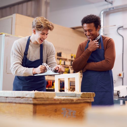 Teacher With Male Carpentry Student in the Future Trade Pathways Program